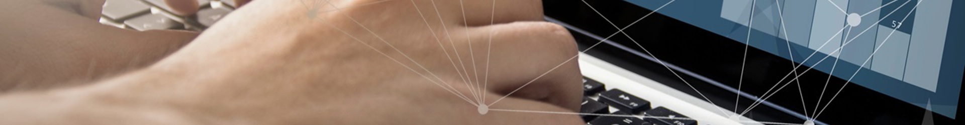 Close up of an Information security managers hands typing on a laptop establishing structured risk management practices