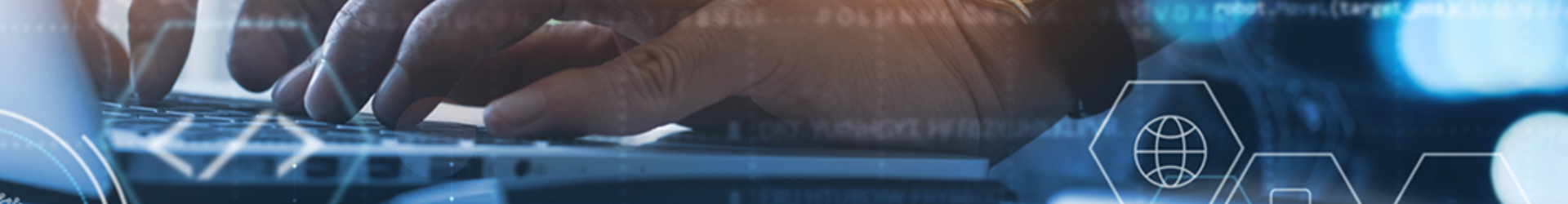 A mans hands typing on a laptop keyboard conducting a pen test