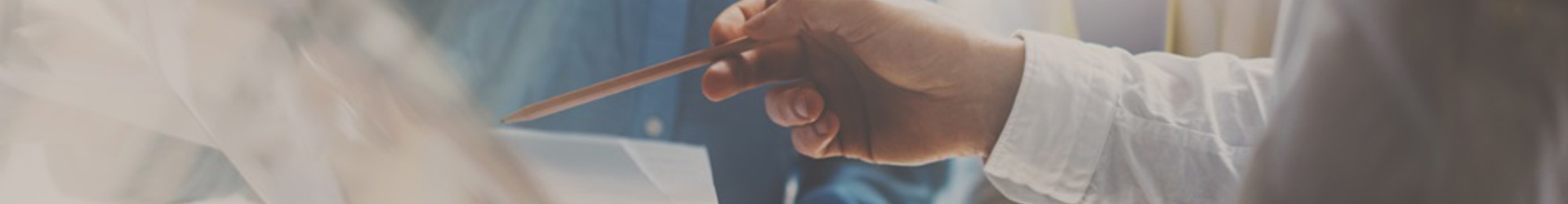 Two IT professionals working on a laptop testing their organisations incident response plan